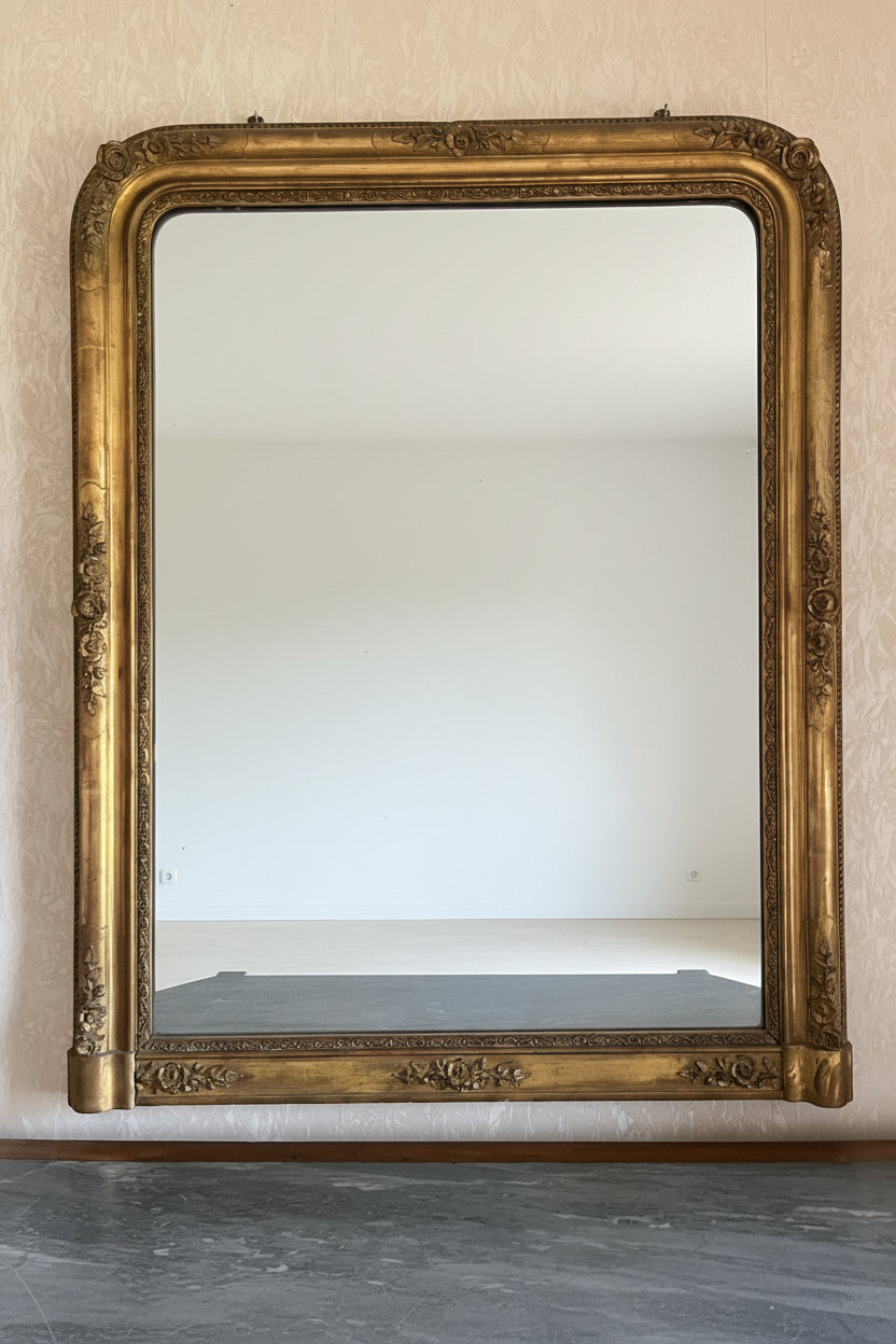 Dreamy Louis Philippe Cintré Gilt Mirror with Floral Cartouches